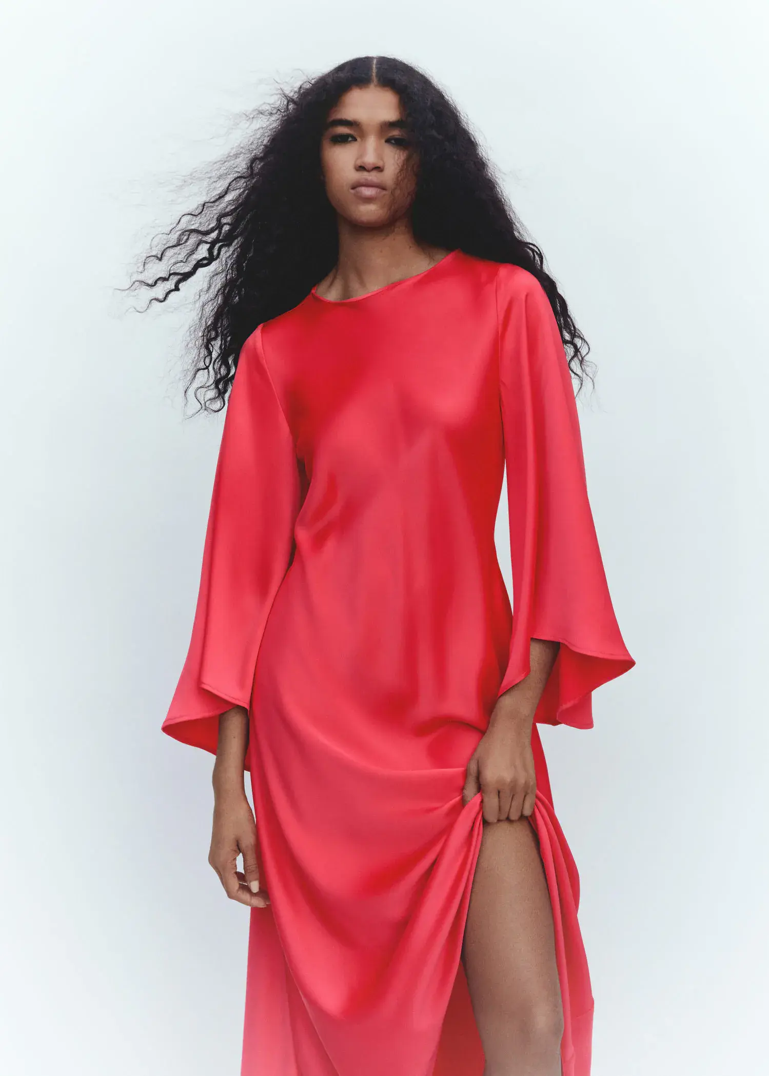 Mango Flared-sleeve satin dress. a woman in a red dress with long sleeves. 