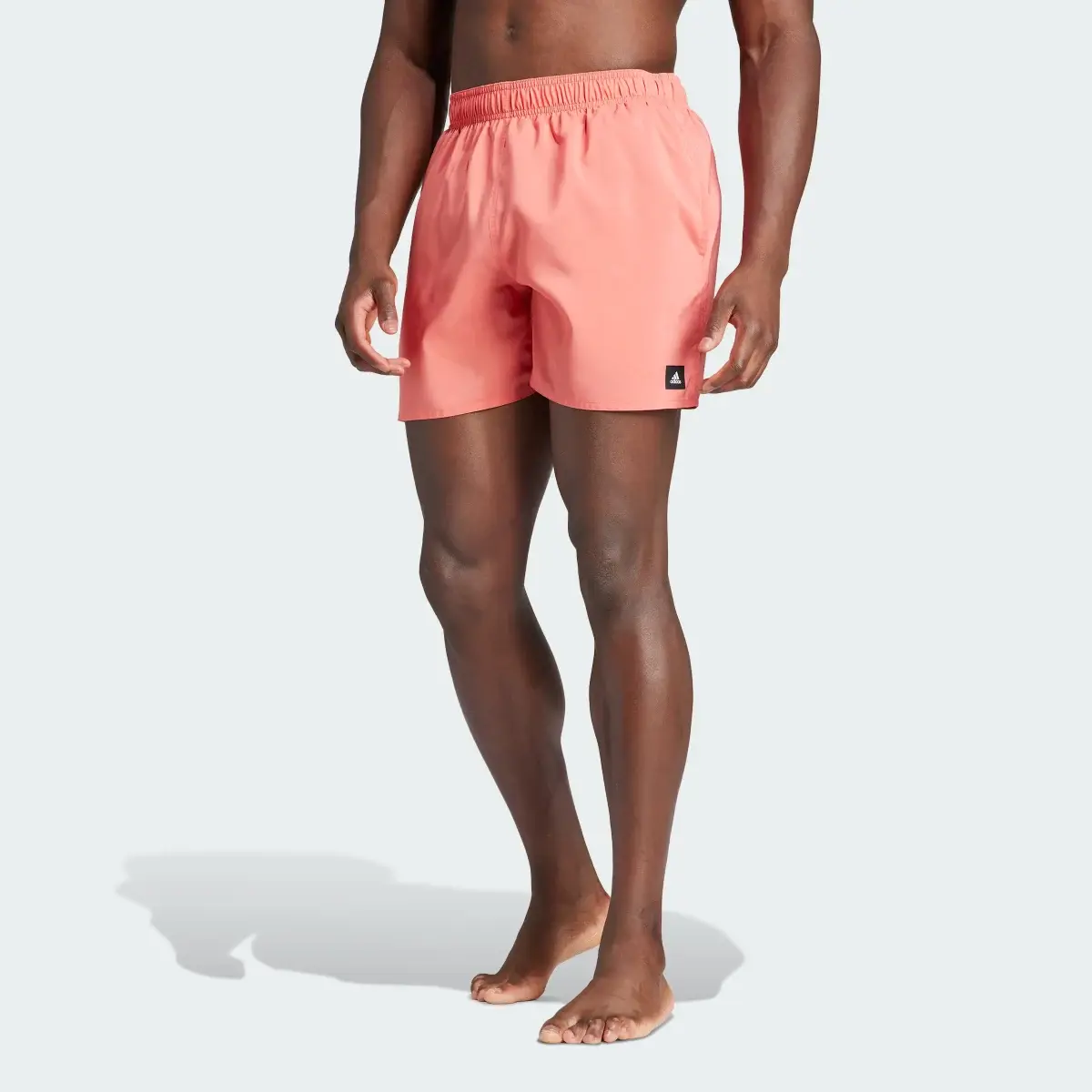 Adidas Solid CLX Short-Length Swim Shorts. 1