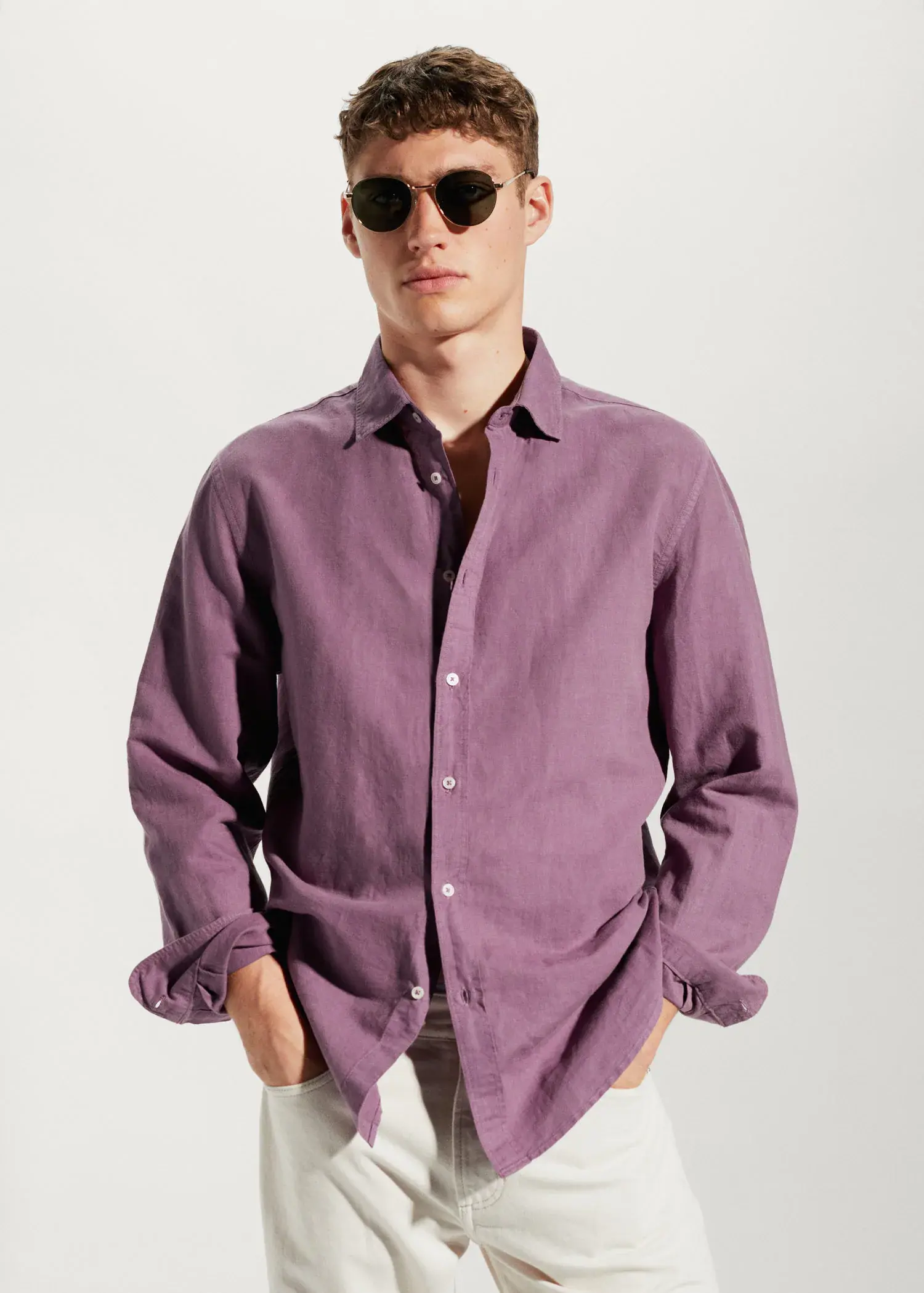 Mango Regular-fit linen cotton shirt. a man wearing a purple shirt and sunglasses. 