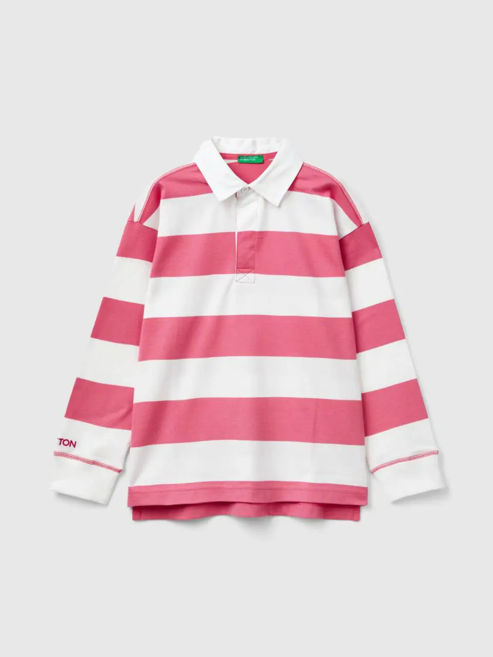 Benetton rugby polo with pink and white stripes. 1