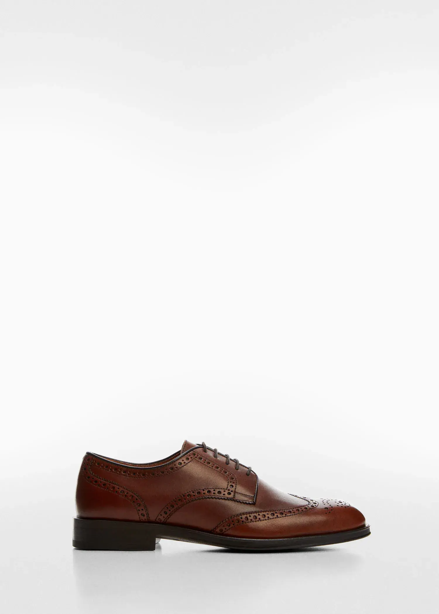 Mango Die-cut leather dress shoes. a pair of brown shoes on a white background. 