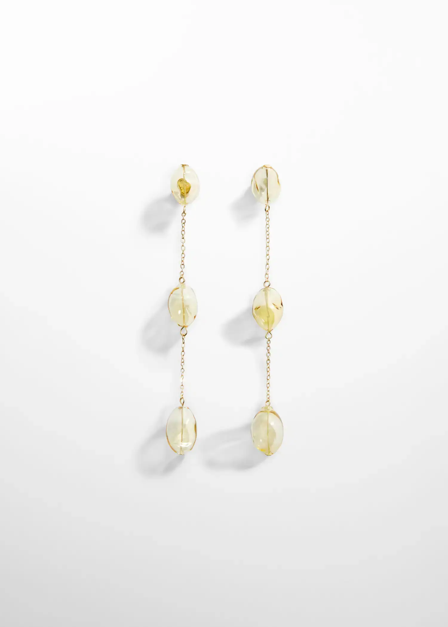 Mango Crystal thread earrings. a pair of earrings hanging from a chain. 