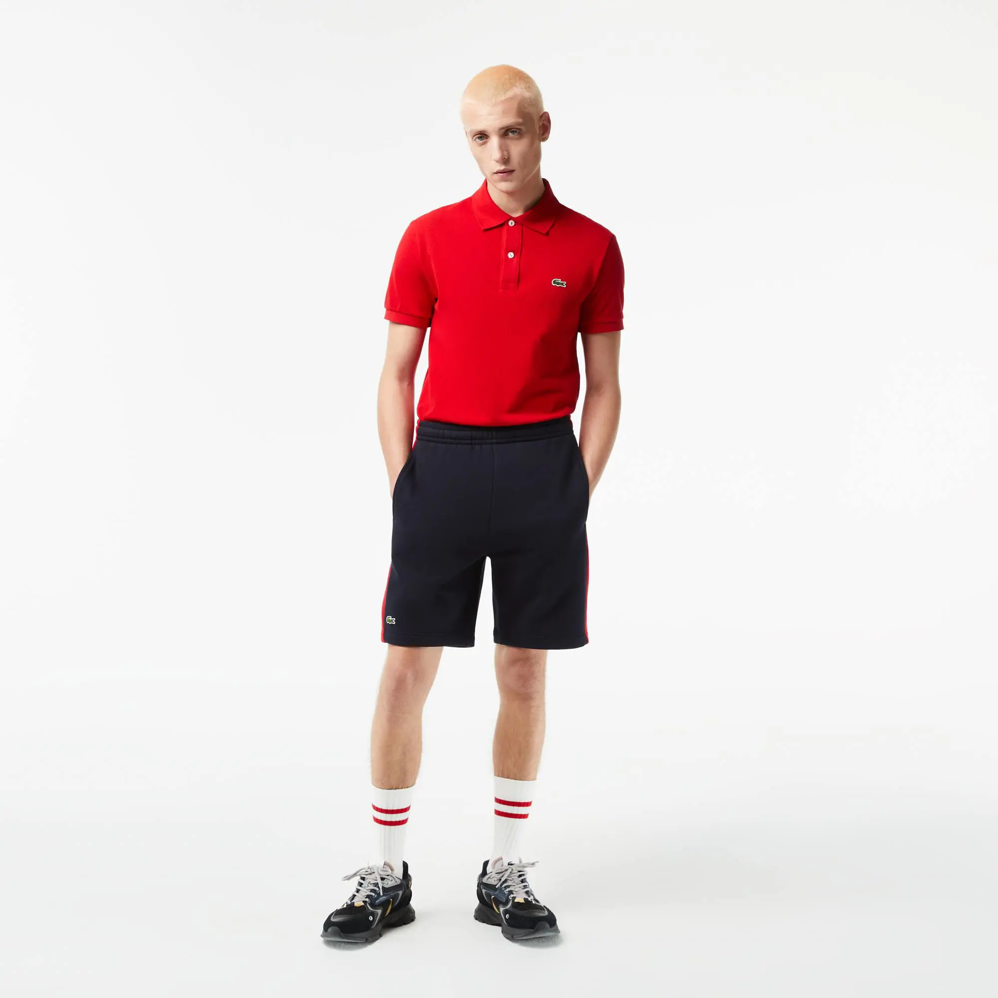 Lacoste Pantalón corto de hombre regular fit en felpa de algodón color block. 1