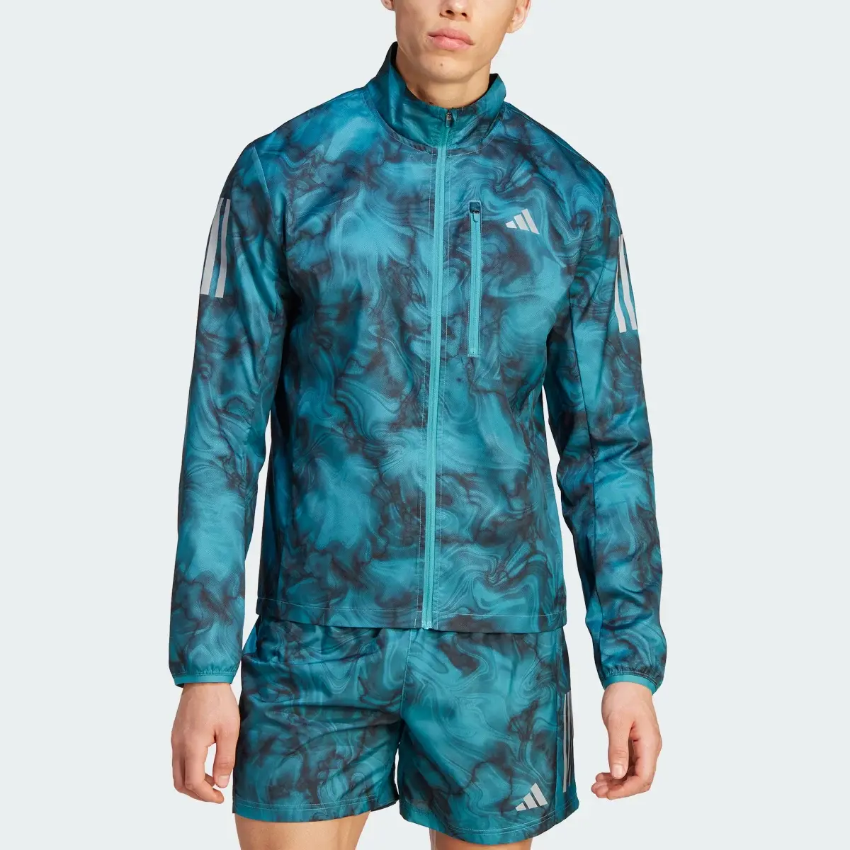 Adidas Own the Run Allover Print Jacket. 1