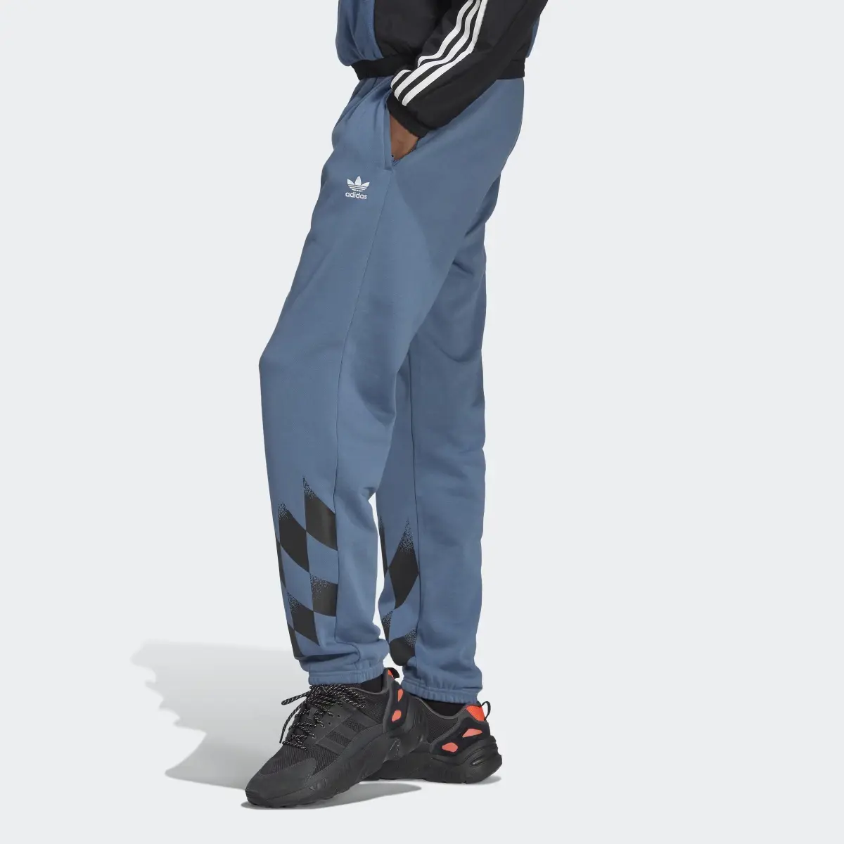Adidas Rekive Placed Graphic Joggers. 2