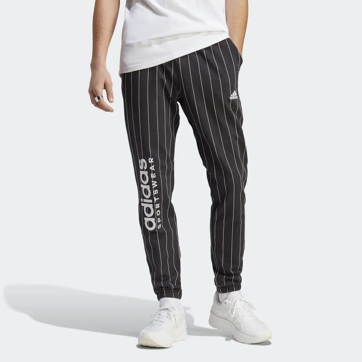 Adidas Pantalon en molleton à fines rayures. 1