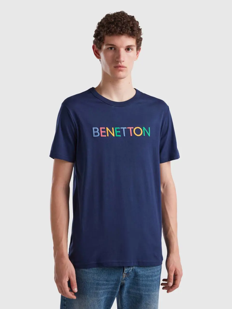Benetton dark blue t-shirt in organic cotton with multicolored logo. 1