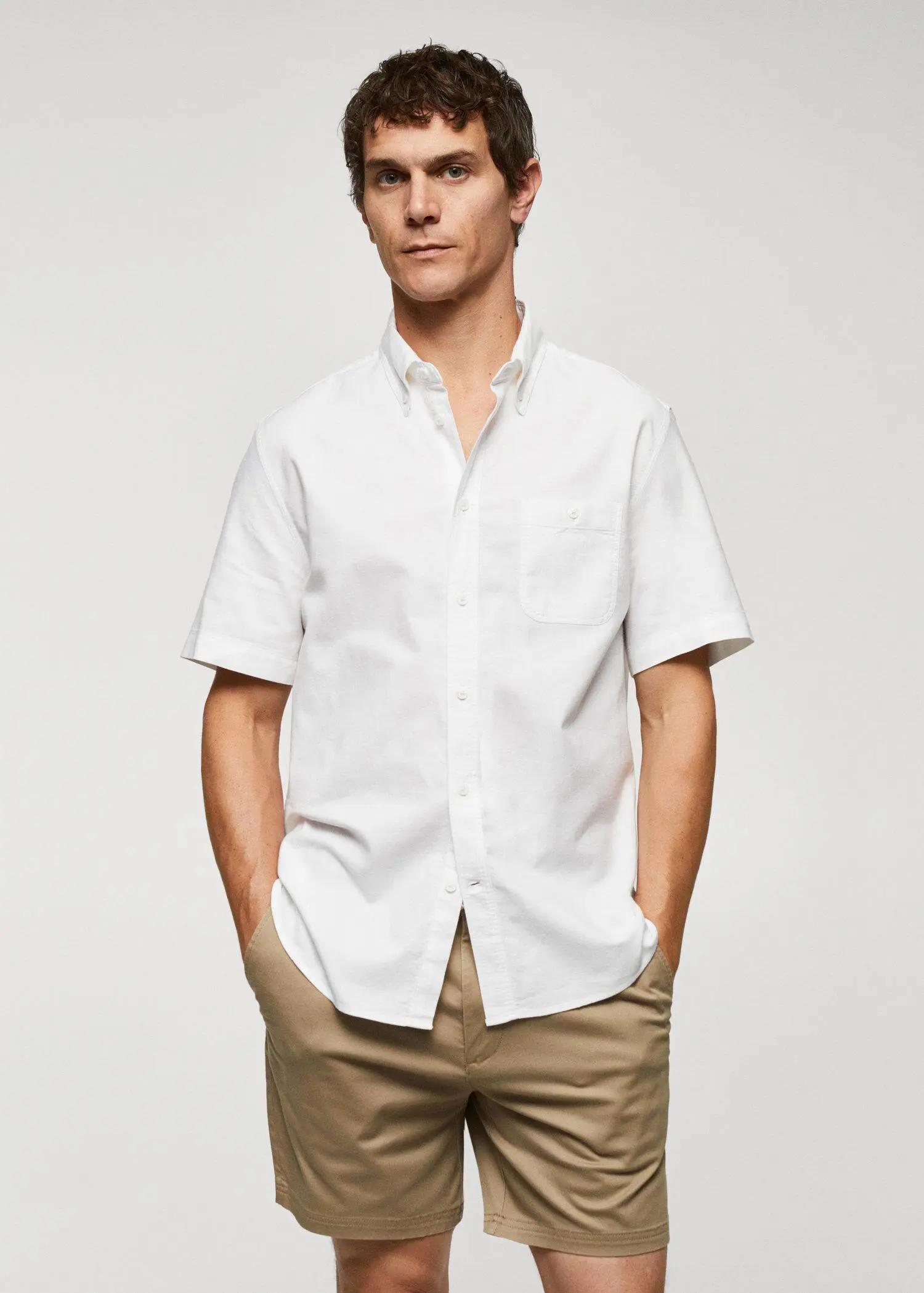 Mango Regular-fit short-sleeved Oxford shirt. 1