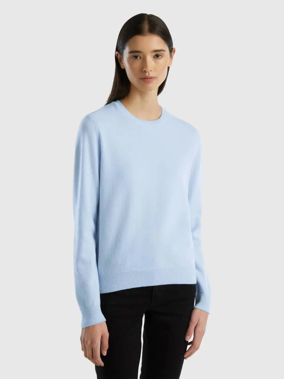 Benetton light blue crew neck sweater in merino wool. 1