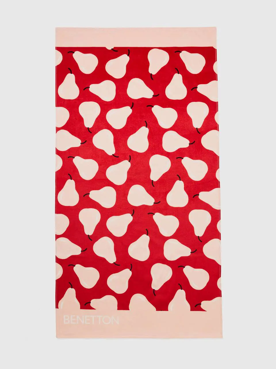 Benetton red beach towel with pear pattern. 1
