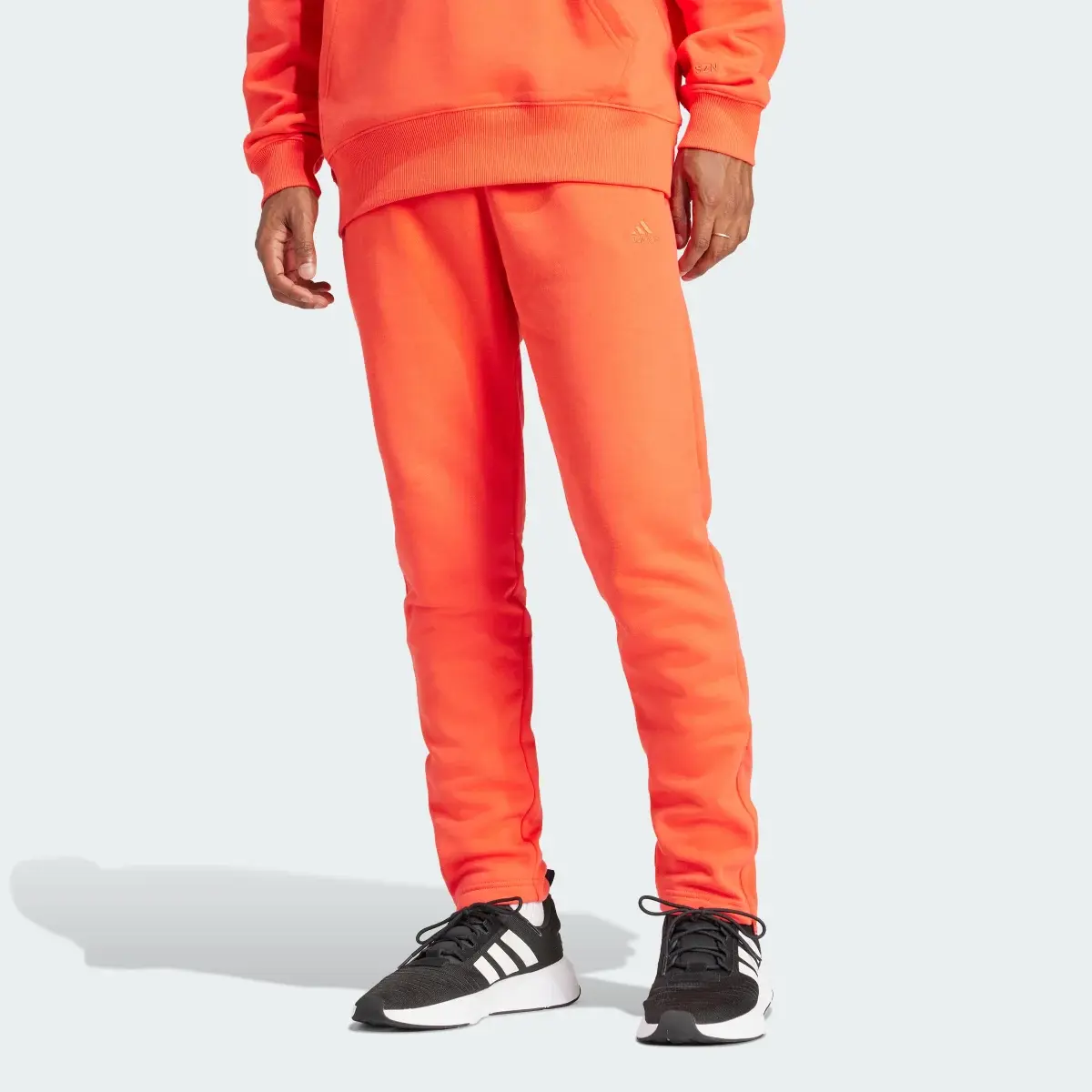 Adidas ALL SZN Fleece Tapered Leg Zip Pants. 1