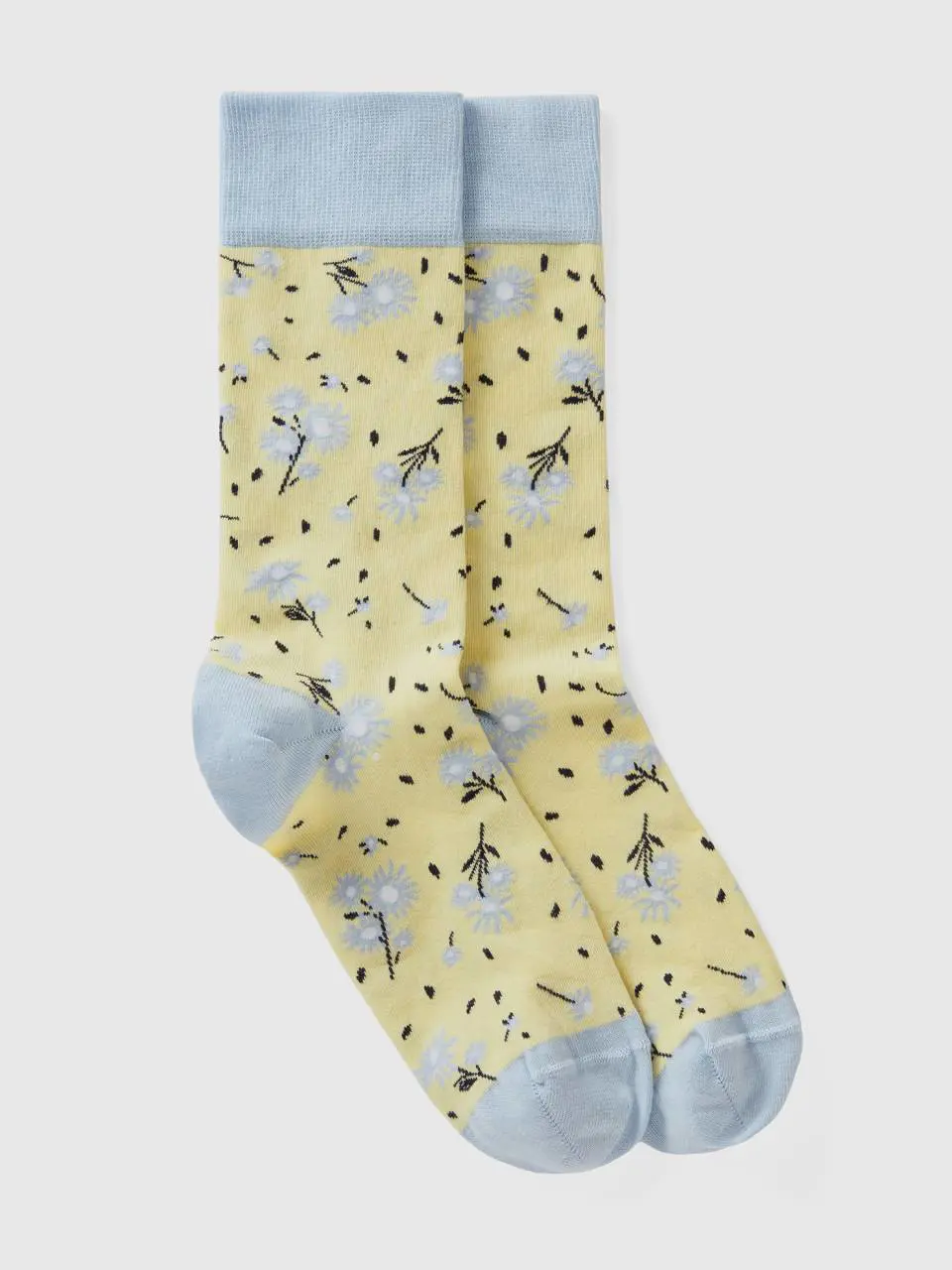 Benetton long yellow and light blue floral socks. 1