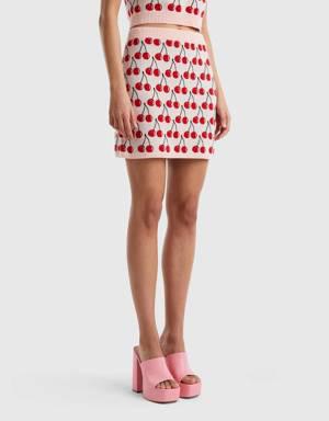 pink mini skirt with cherry pattern