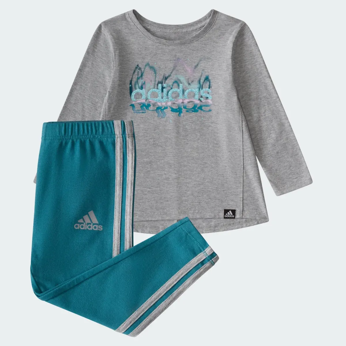 Adidas N LS SWING TEE GFX TIGHT SET. 1