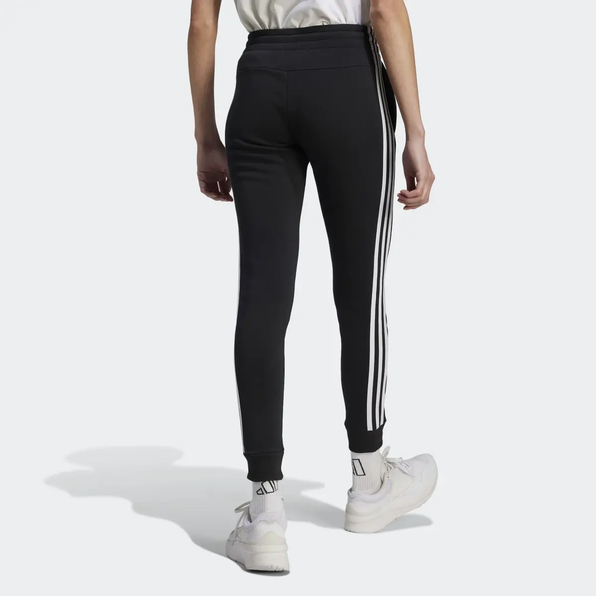 Adidas Essentials 3-Stripes Fleece Pants. 2