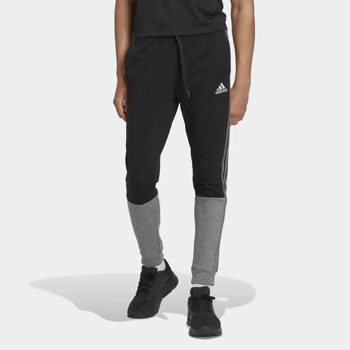 Adidas Essentials Mélange French Terry Pants. 1