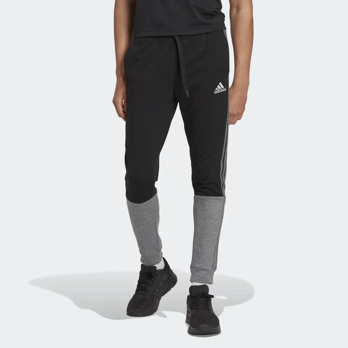 Adidas Pantalon molleton chiné Essentials. 1