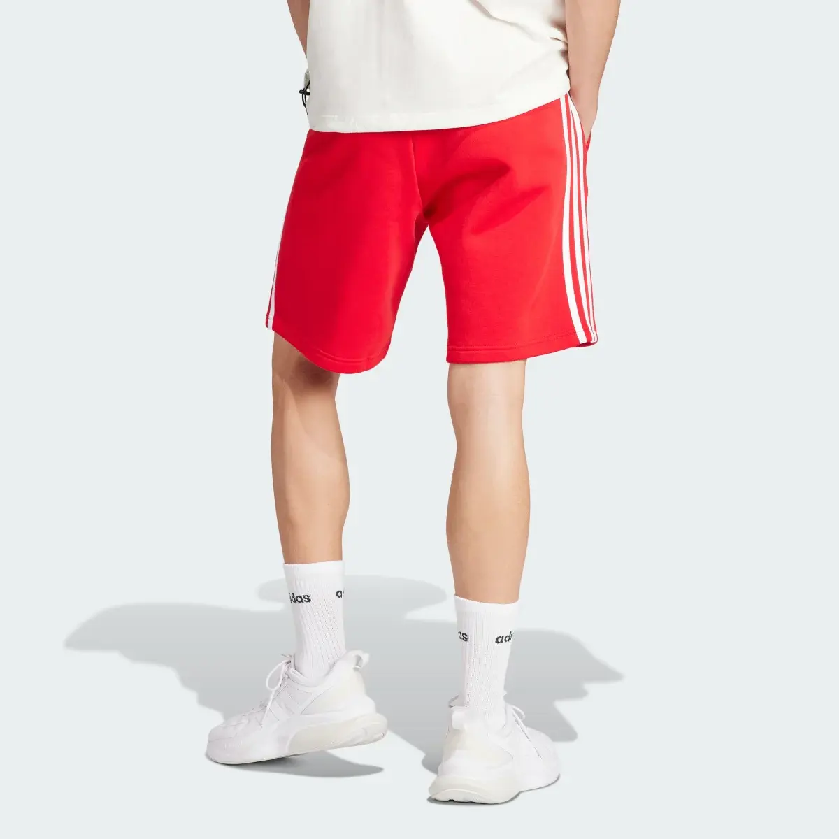 Adidas Shorts Essentials 3 Franjas Tela Fleece. 2