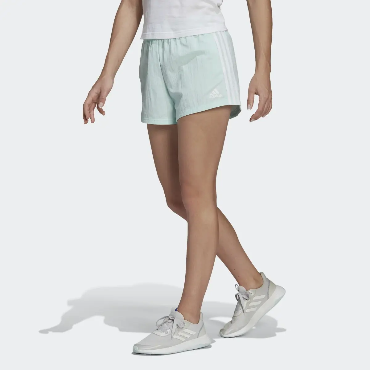 Adidas Essentials 3-Stripes Woven Shorts (Loose Fit). 1