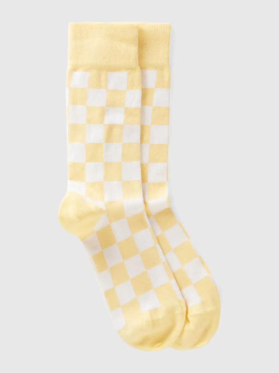 Benetton white and yellow checkered socks. 1