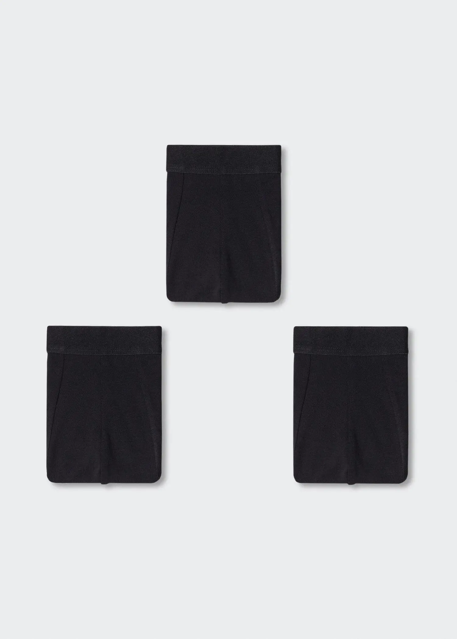 Mango 3-pack of black cotton boxer shorts. a set of three bags hanging on a wall. 