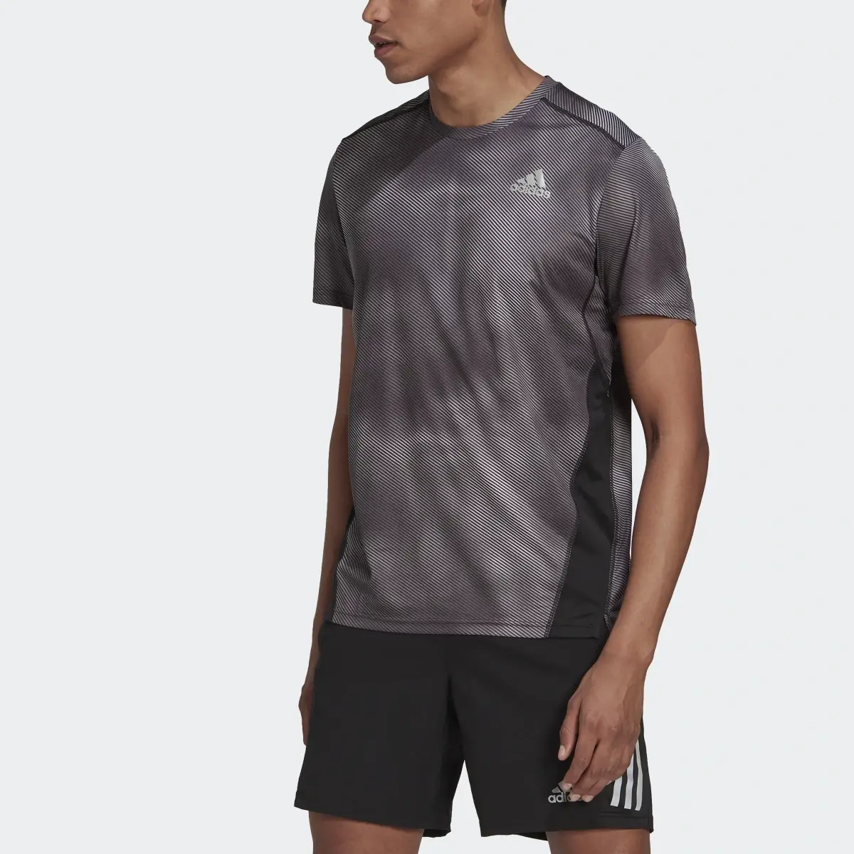 Adidas Camiseta Own the Run Colorblock. 1