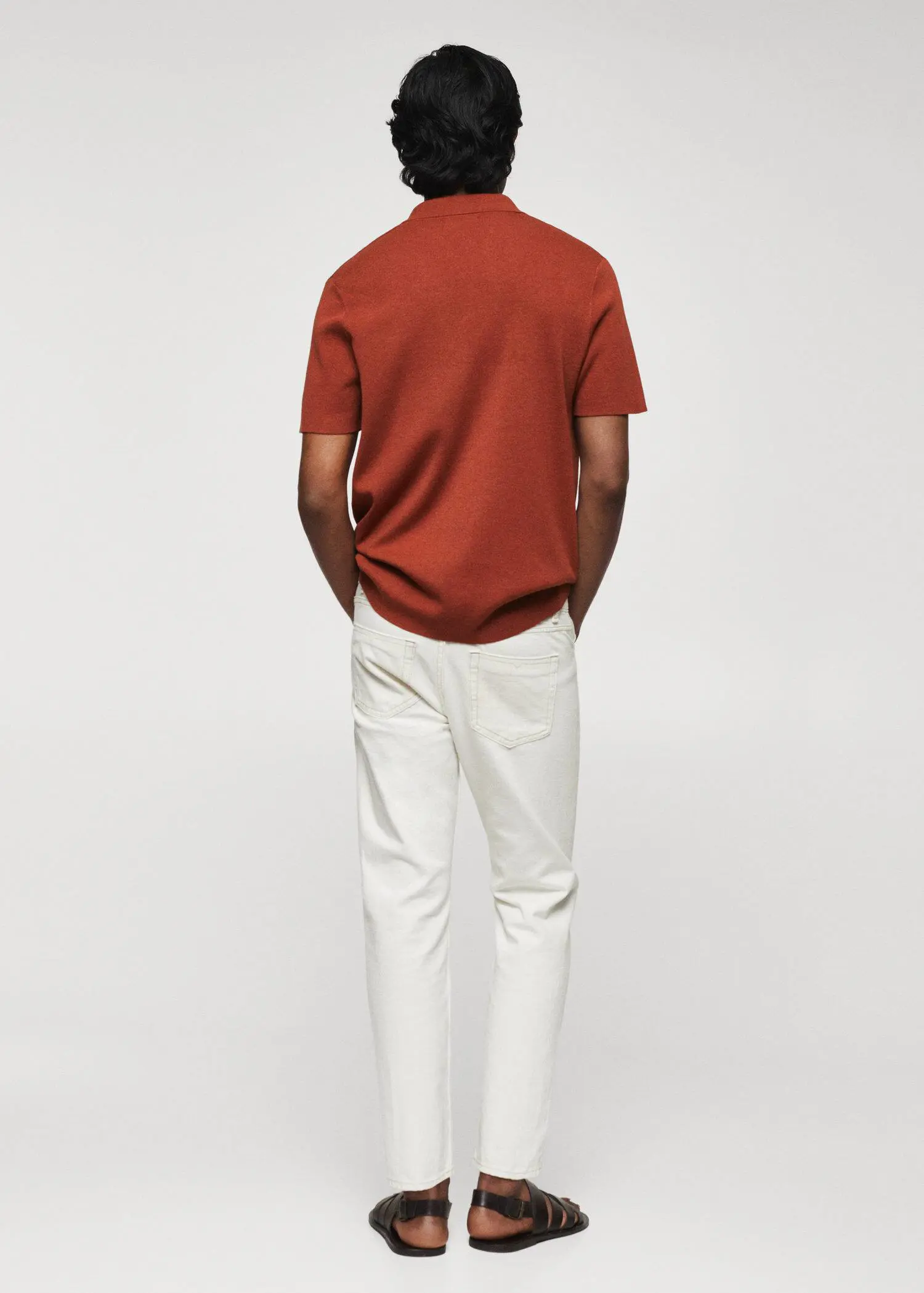 Mango Fine-knit polo shirt. a man in a red shirt and white pants. 