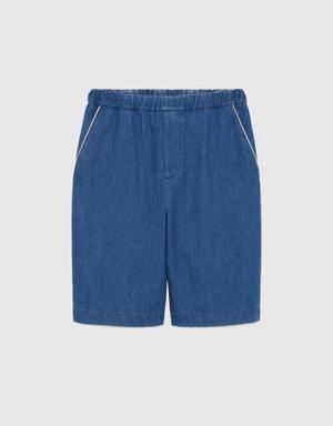 Denim shorts with G Gucci patch