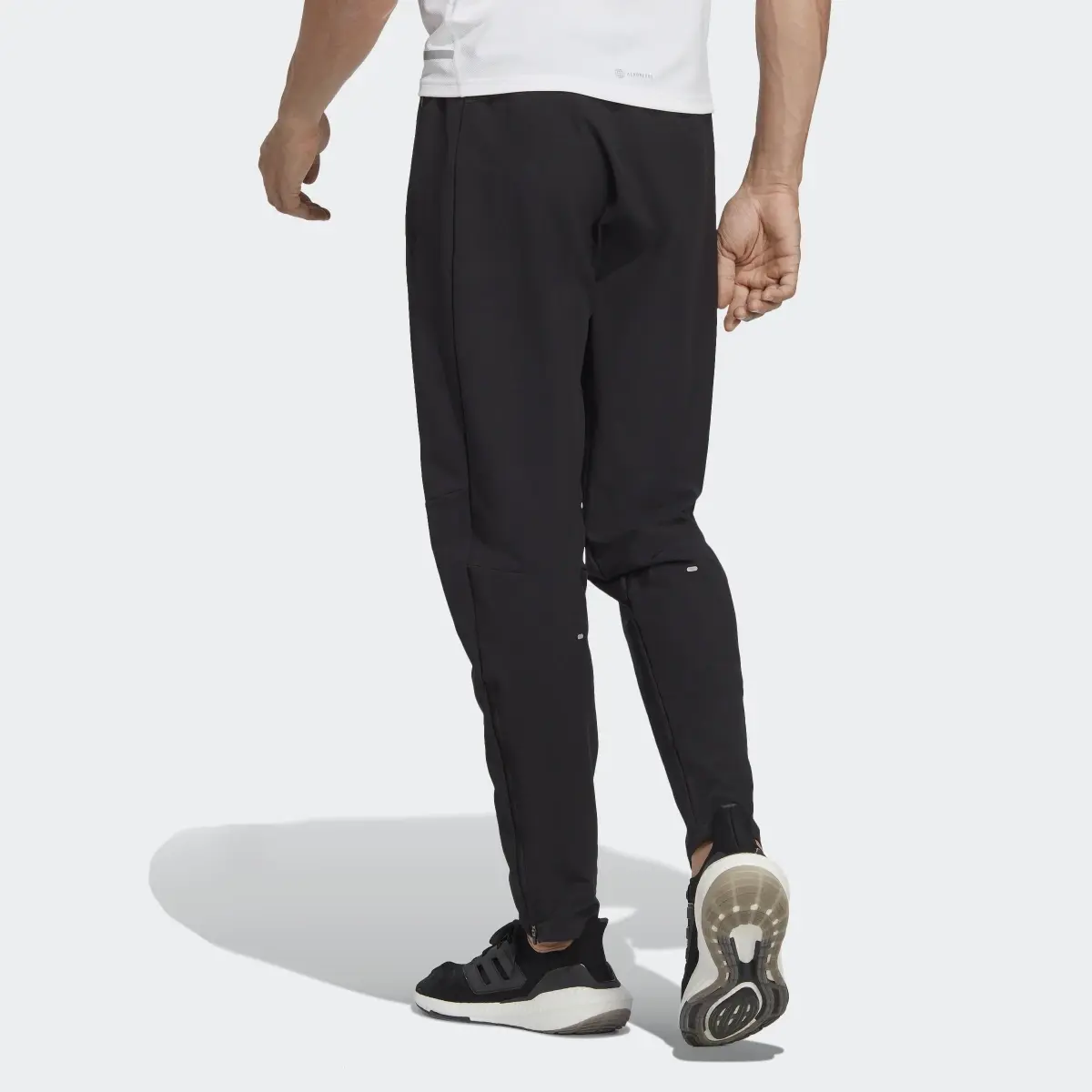 Adidas Pants Own the Run Shell. 2