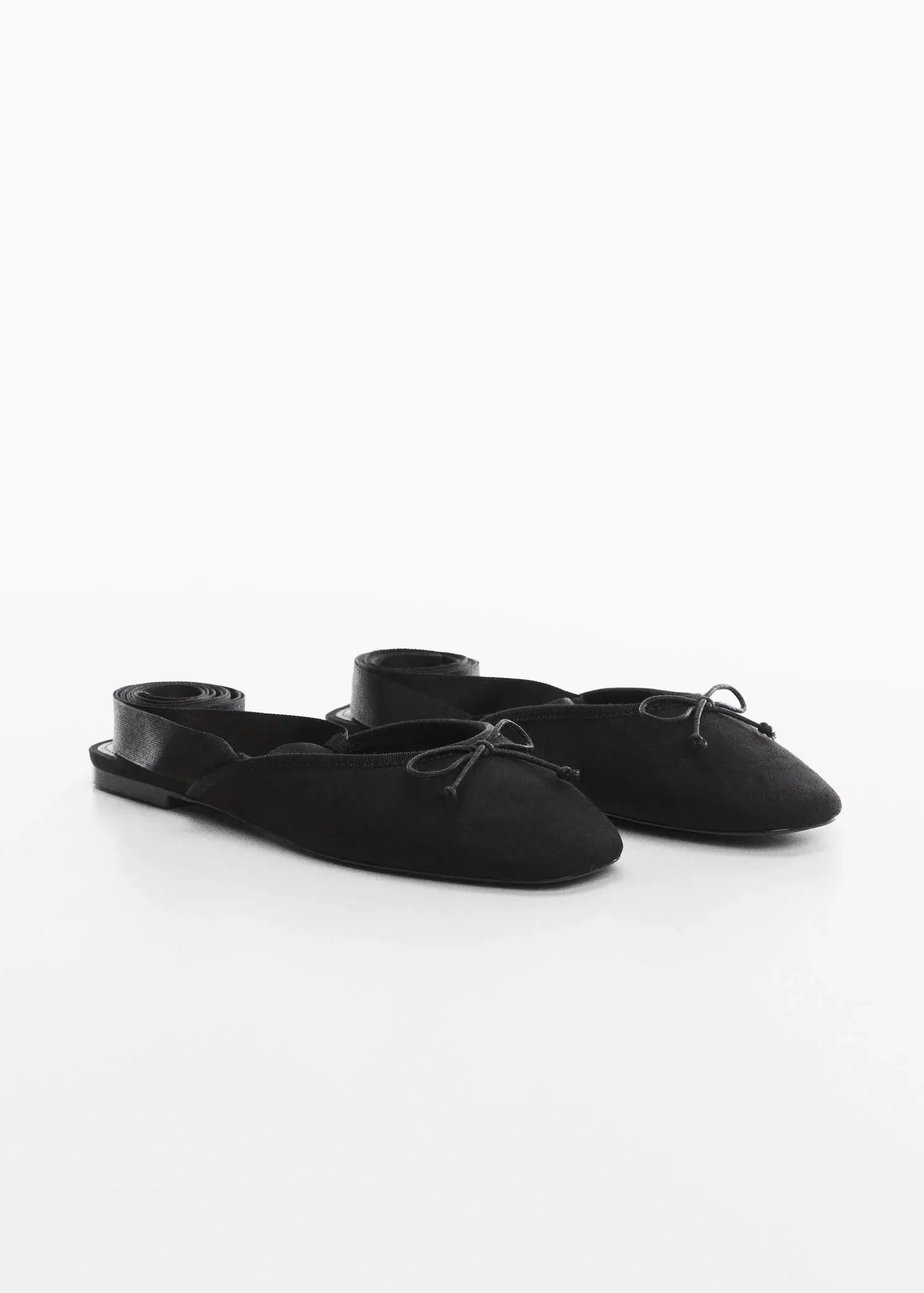 Mango Lace-up ballerinas. a pair of black ballet slippers on a white surface. 