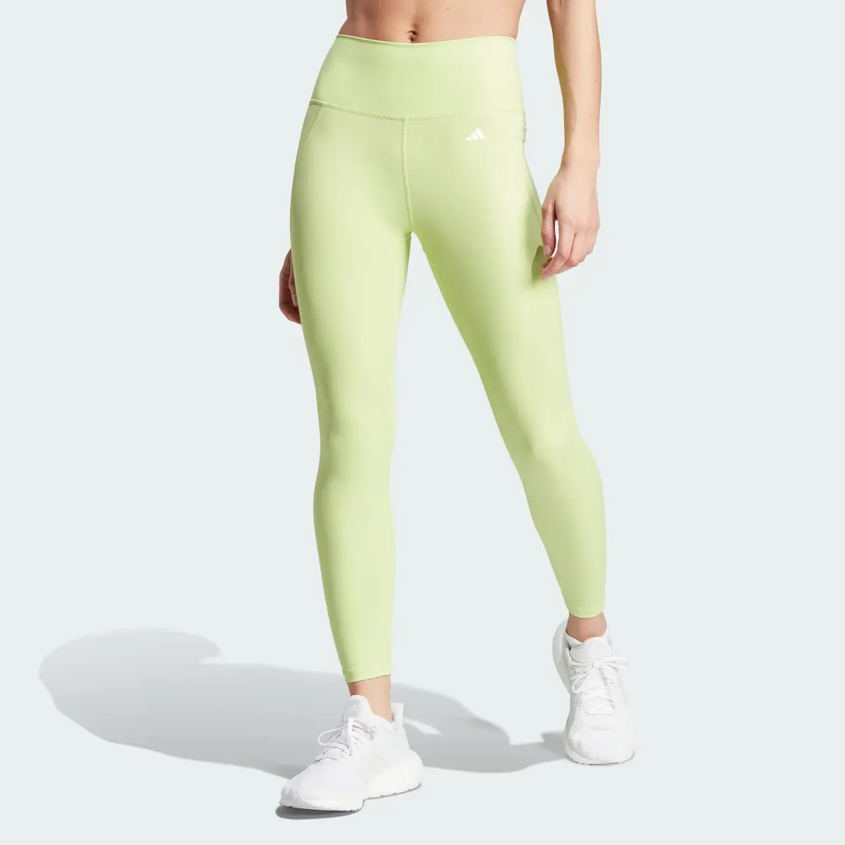 Adidas Optime Stash Pocket High-Waisted 7/8 Leggings. 1