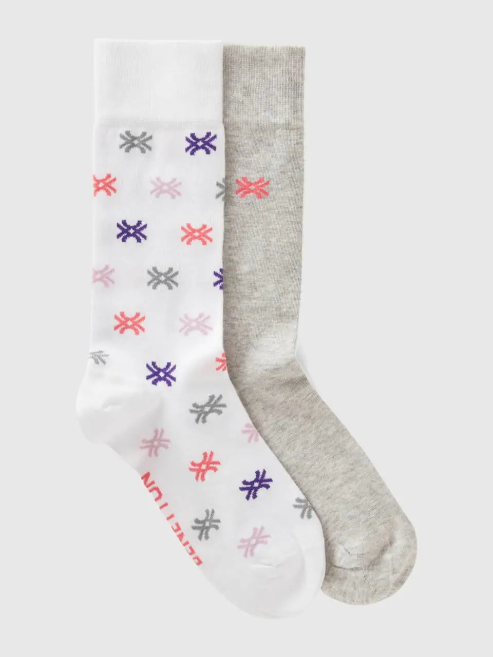 Benetton two pairs of white and light gray socks. 1