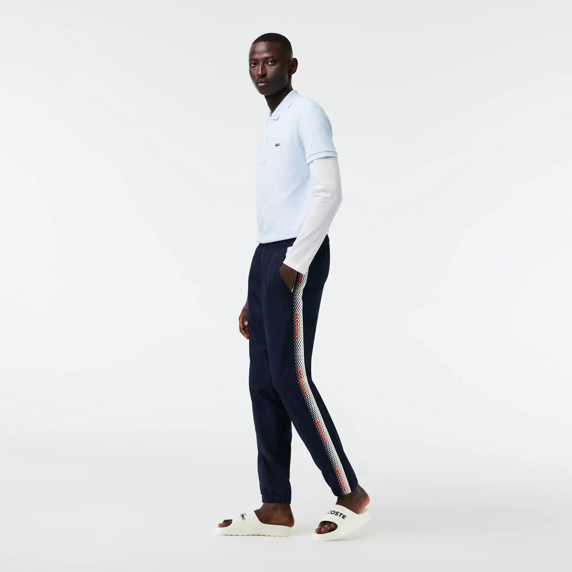 Lacoste Men’s Lacoste Regular Fit Track Pants. 1