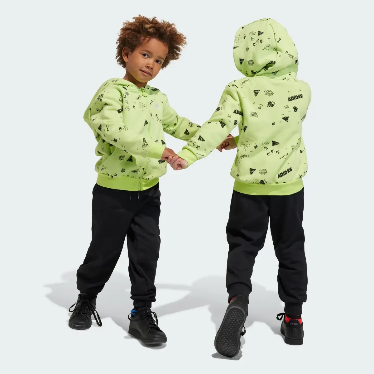 Adidas Brand Love Hooded Kids Trainingsanzug. 1