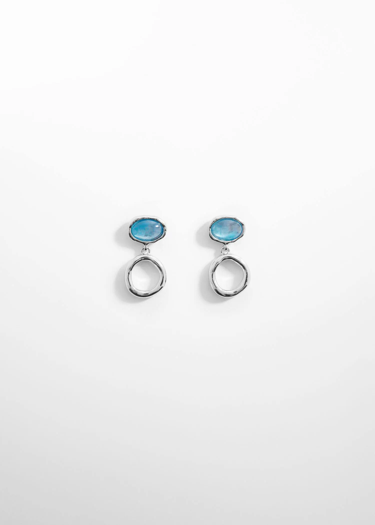 Mango Bead loop earrings. a pair of blue earrings on a white surface. 