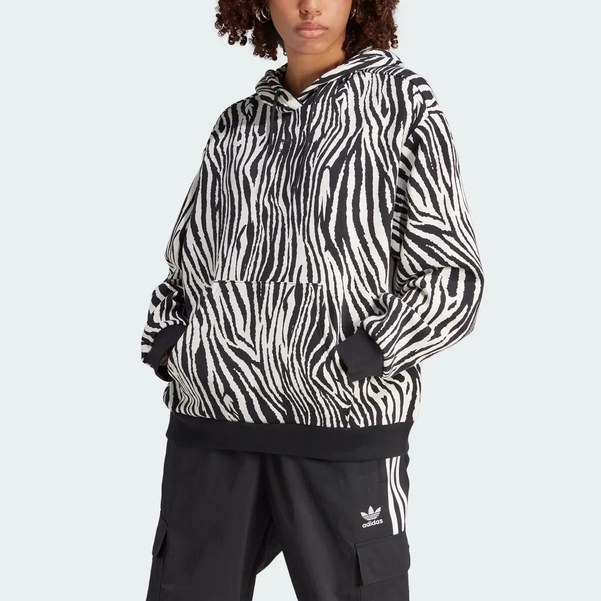 Adidas Sweat-shirt à capuche à imprimé animal zèbre intégral Essentials. 1