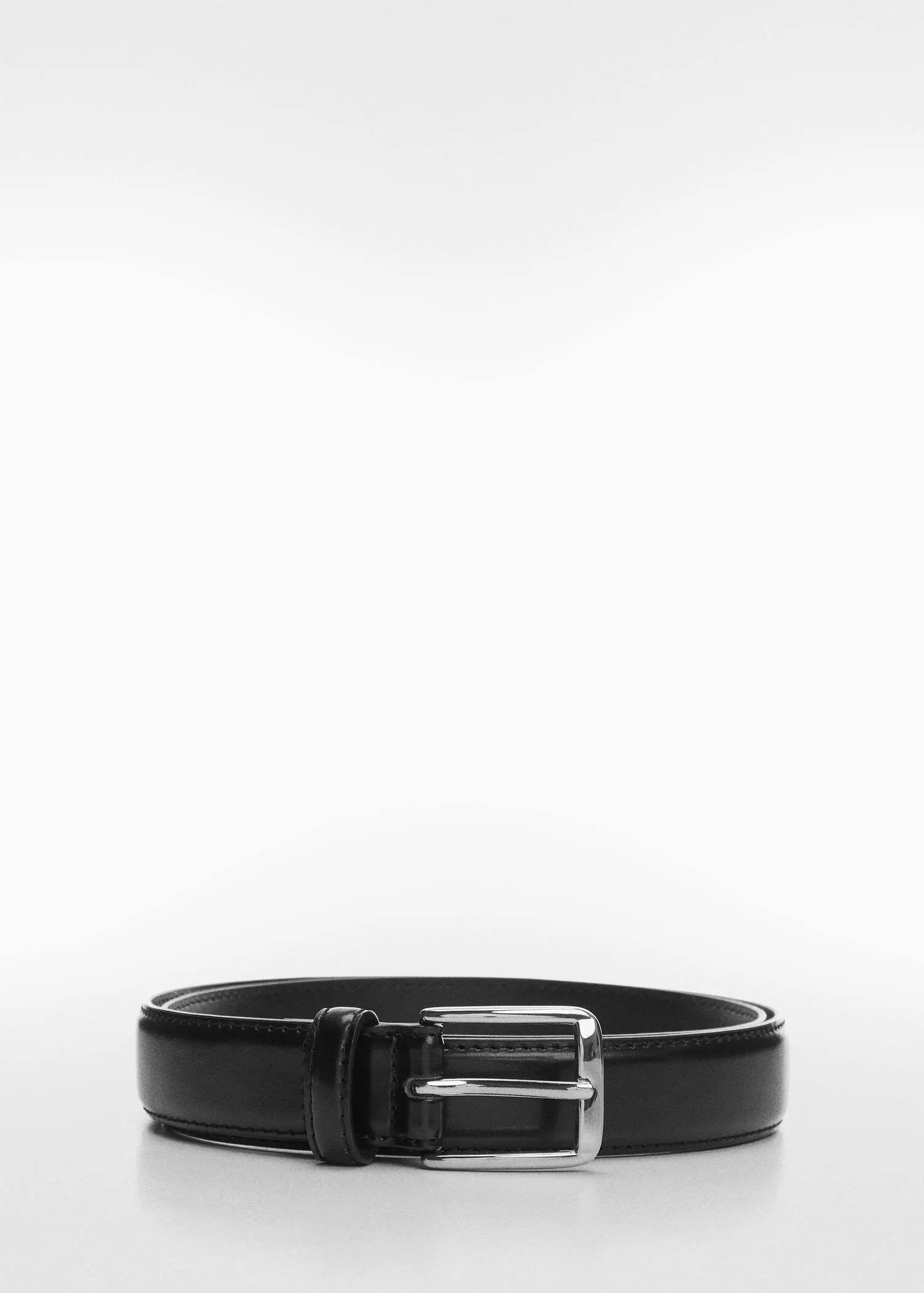 Mango Leather belt. a close up of a belt on a white background 