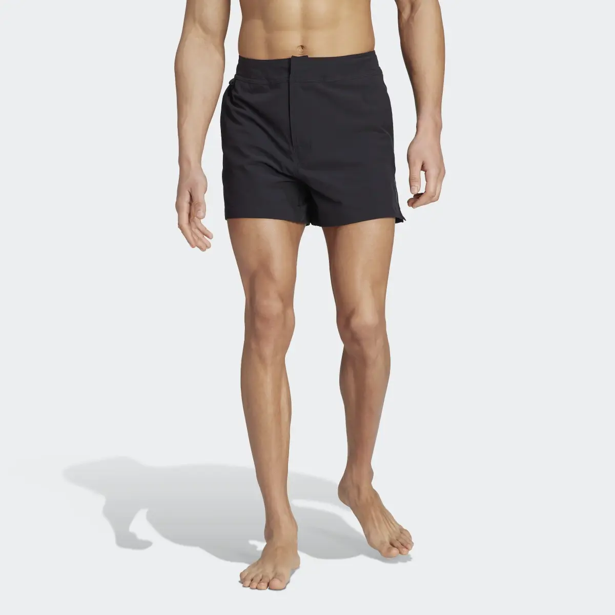 Adidas Short de bain Versatile. 1