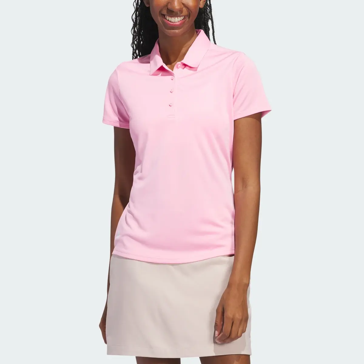 Adidas Women's Solid Performance Short Sleeve Polo Shirt. 1