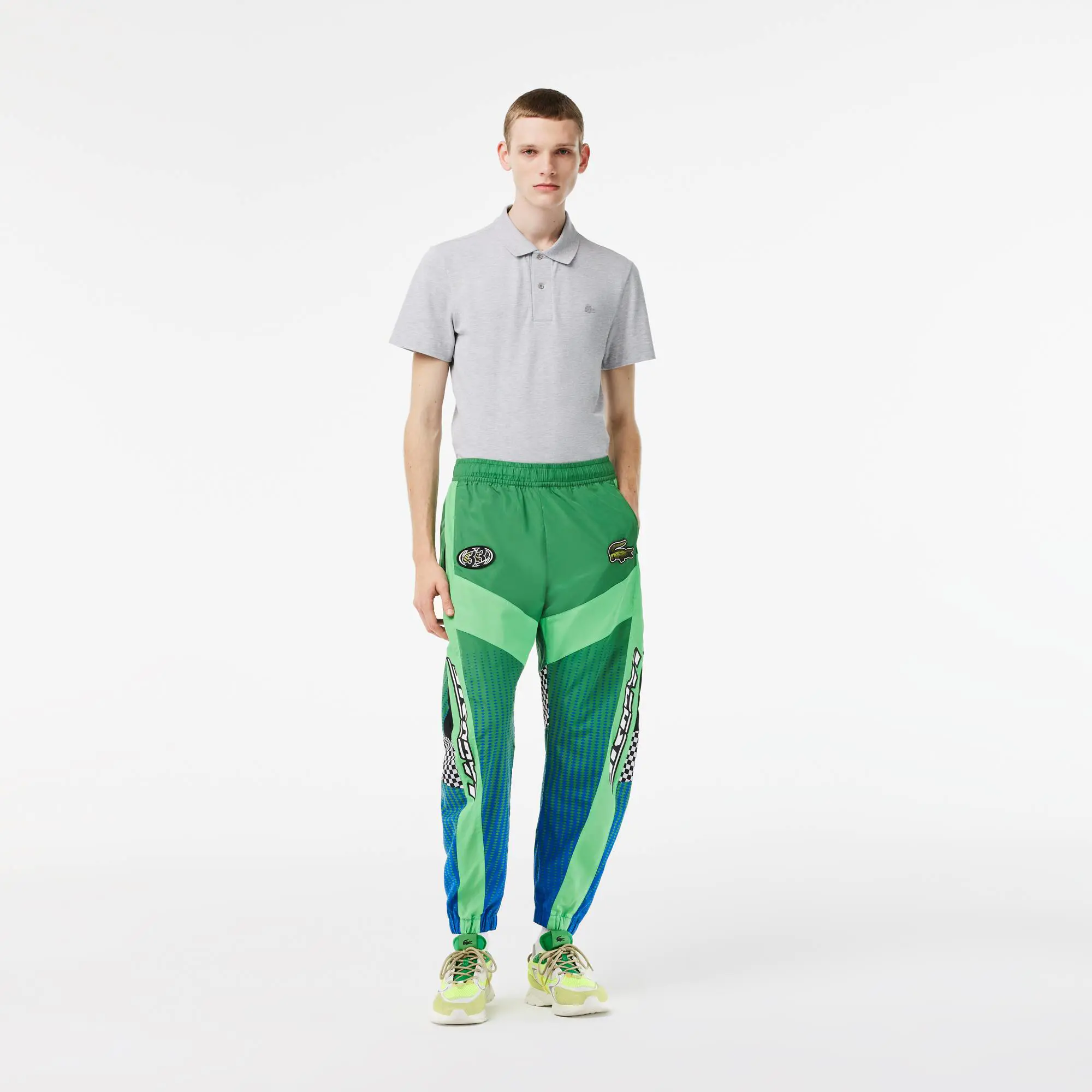 Lacoste Men’s Ombré Checkerboard Print Joggers. 1