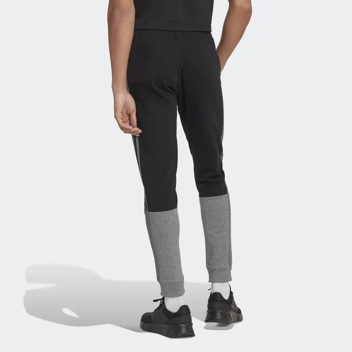 Adidas Essentials Mélange French Terry Joggers. 2