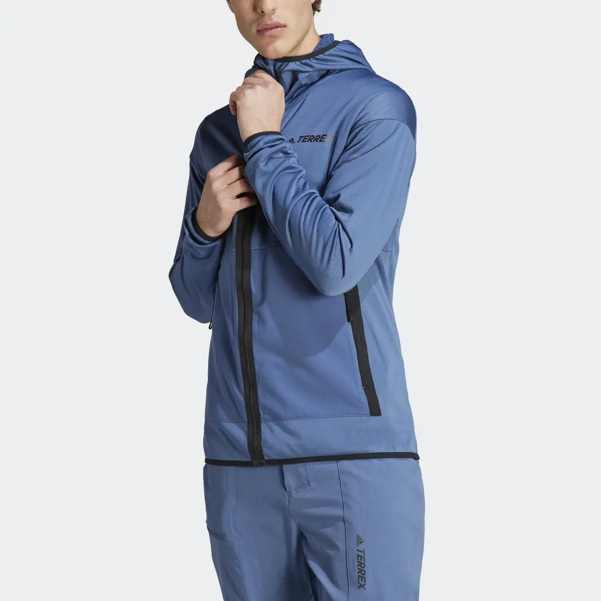 Adidas TERREX Tech Fleece Light Hooded Hiking Jacket. 1