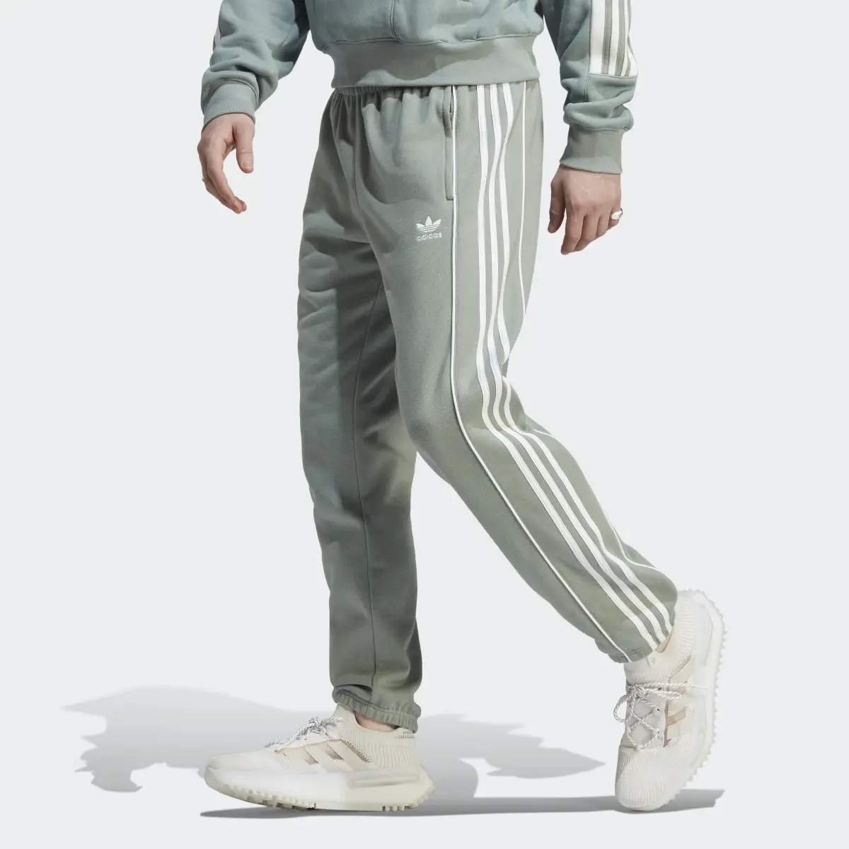 Adidas Pantalon de survêtement adidas Rekive. 1