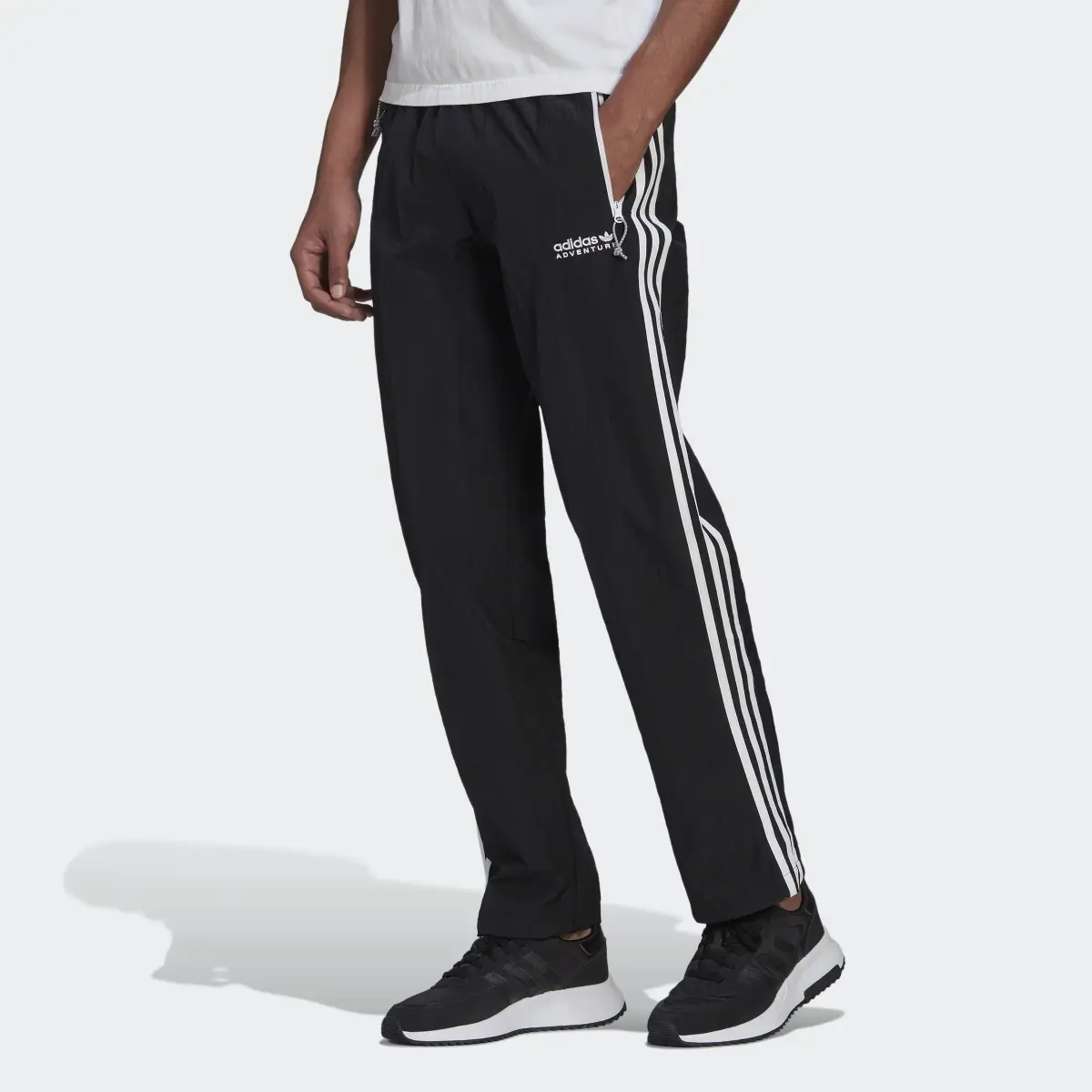 Adidas Adventure Track Pants. 1