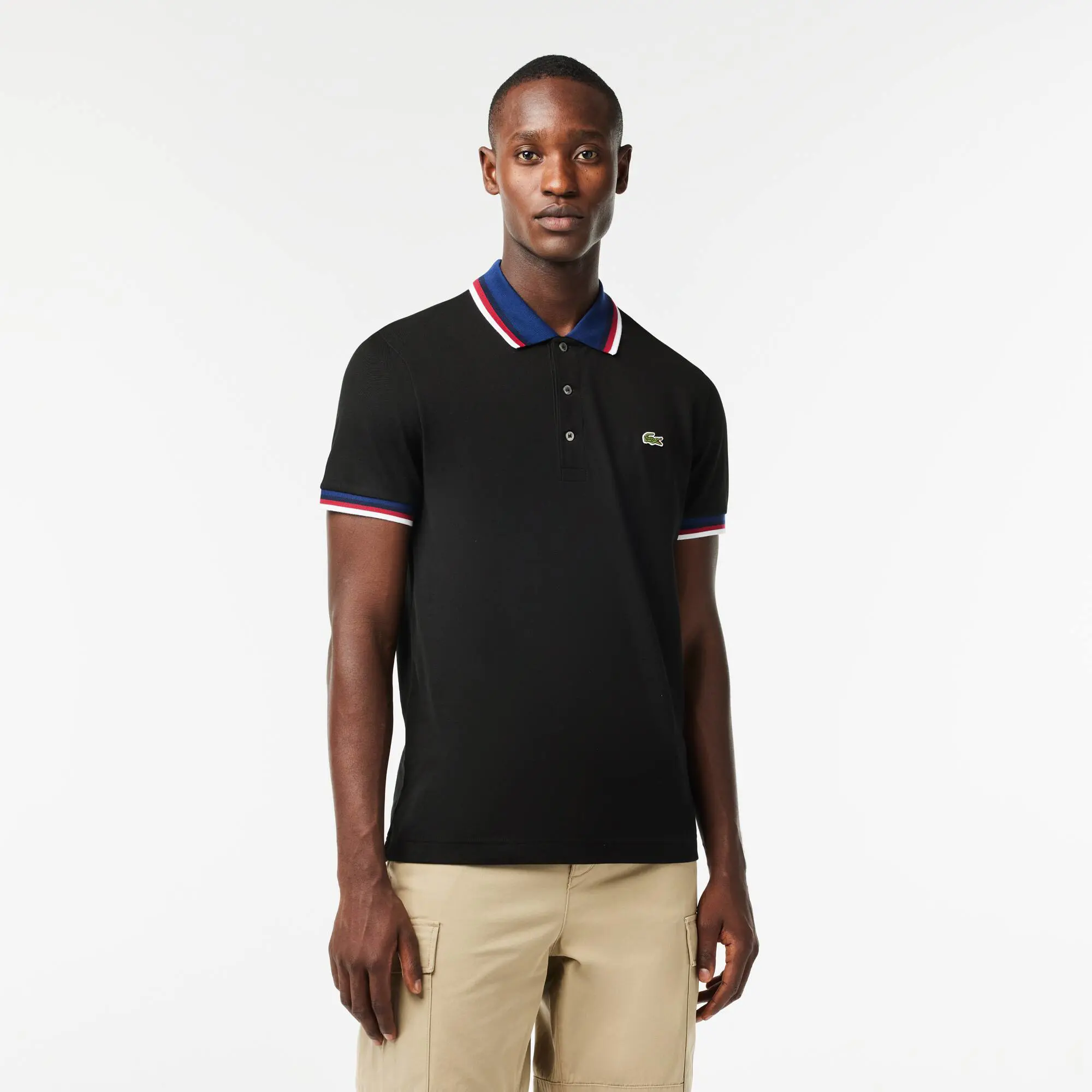 Lacoste Poloshirt aus Stretch-Baumwoll-Piqué mit Kontrastkragen. 1