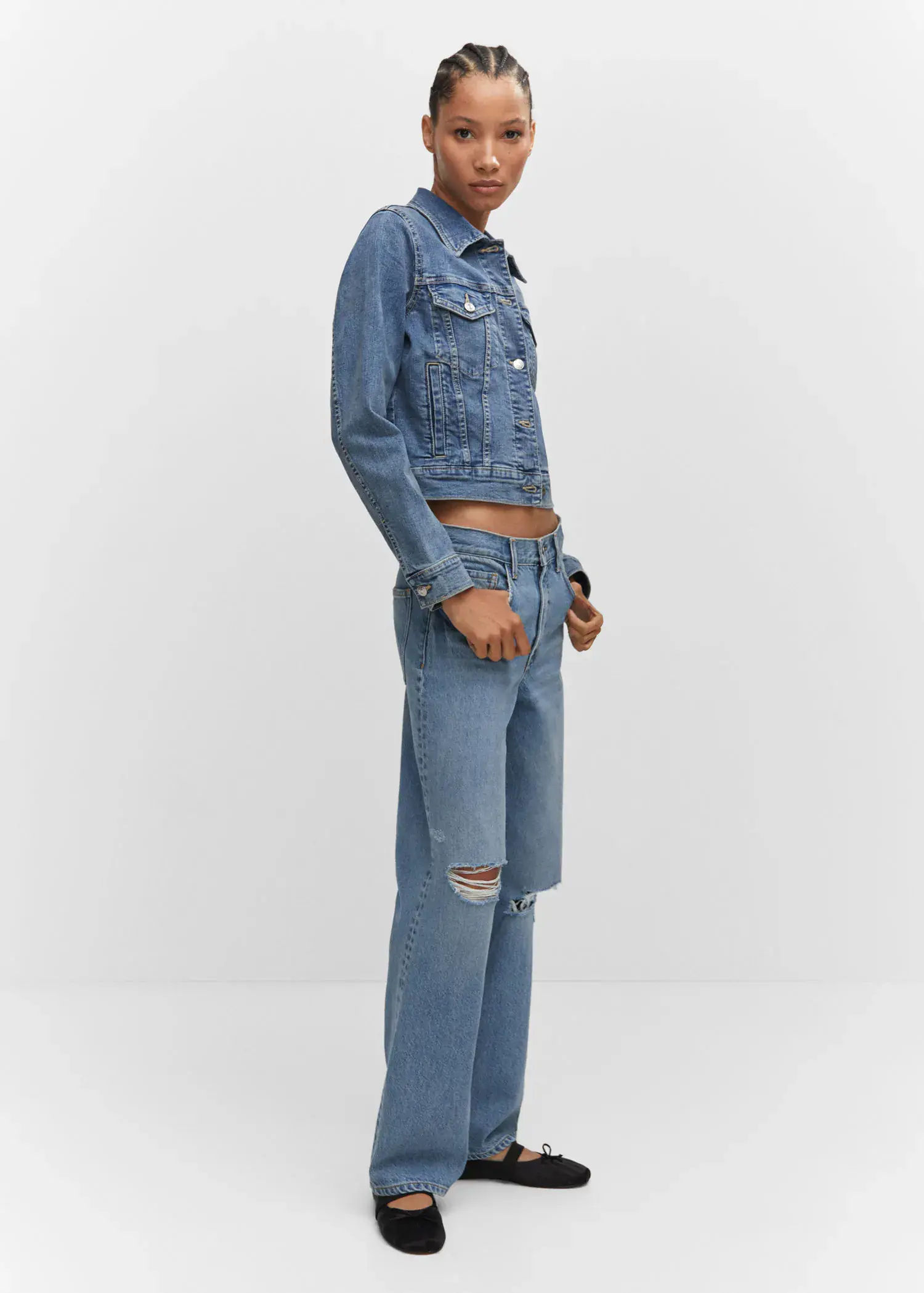 Mango Pocketed denim jacket. a person standing wearing a jean jacket and jeans. 