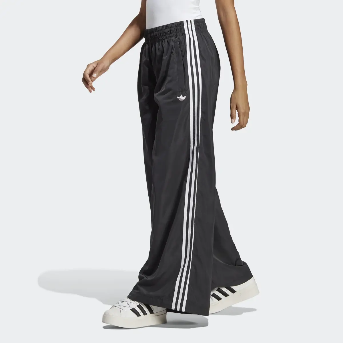 Adidas Pantalon de survêtement oversize. 1