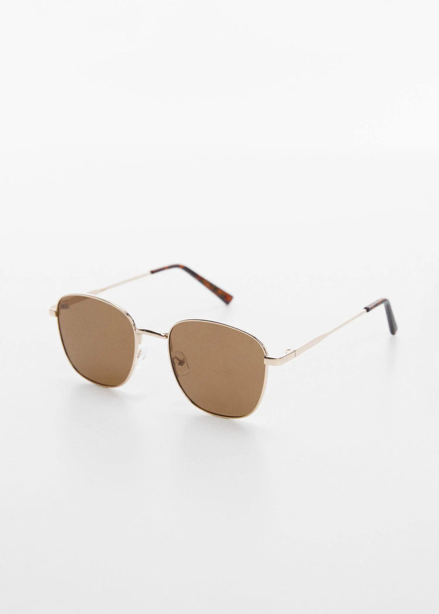 Mango Polarised sunglasses. a pair of brown sunglasses sitting on top of a table. 