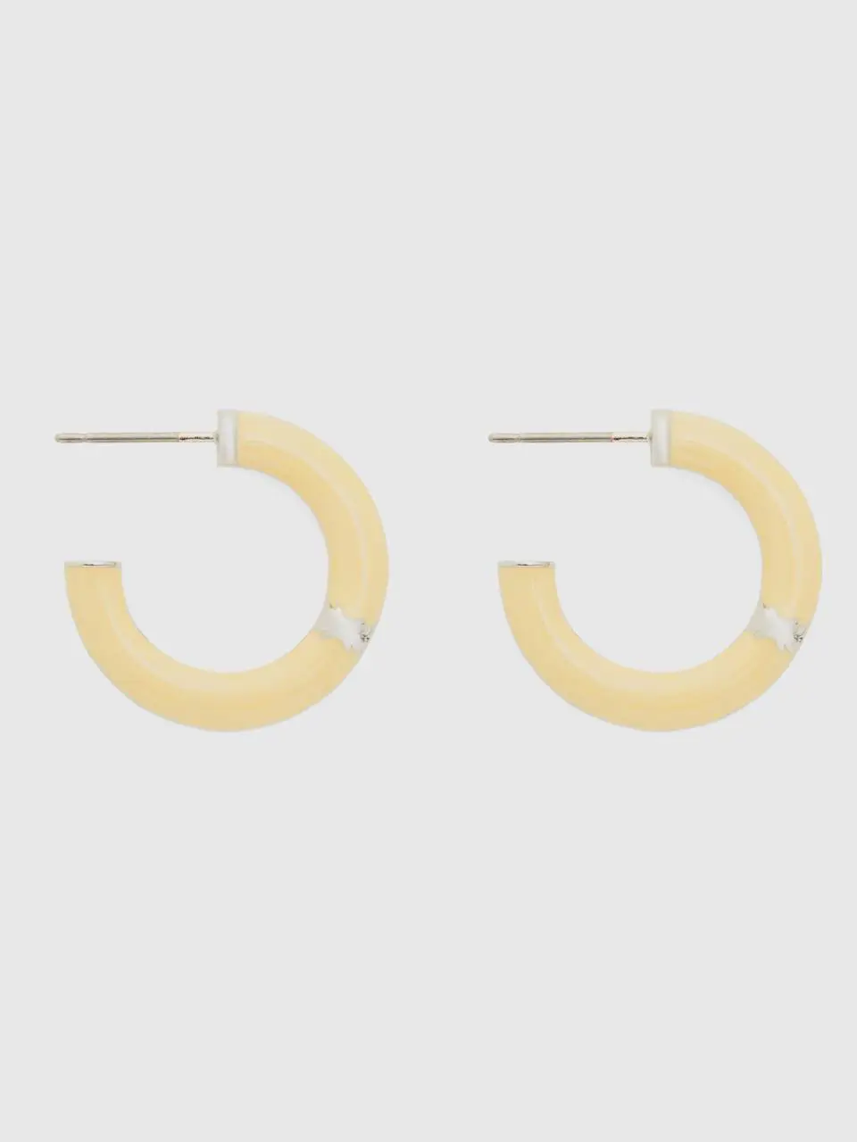 Benetton light yellow c hoop earrings. 1