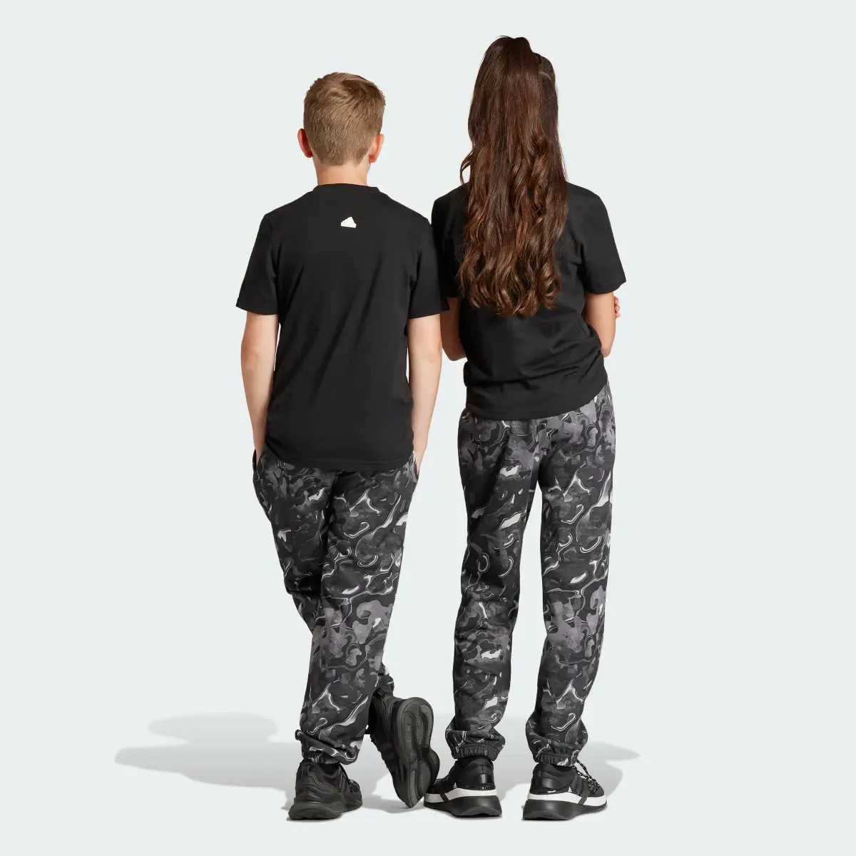 Adidas Spodnie Future Icons Allover Print Kids. 2